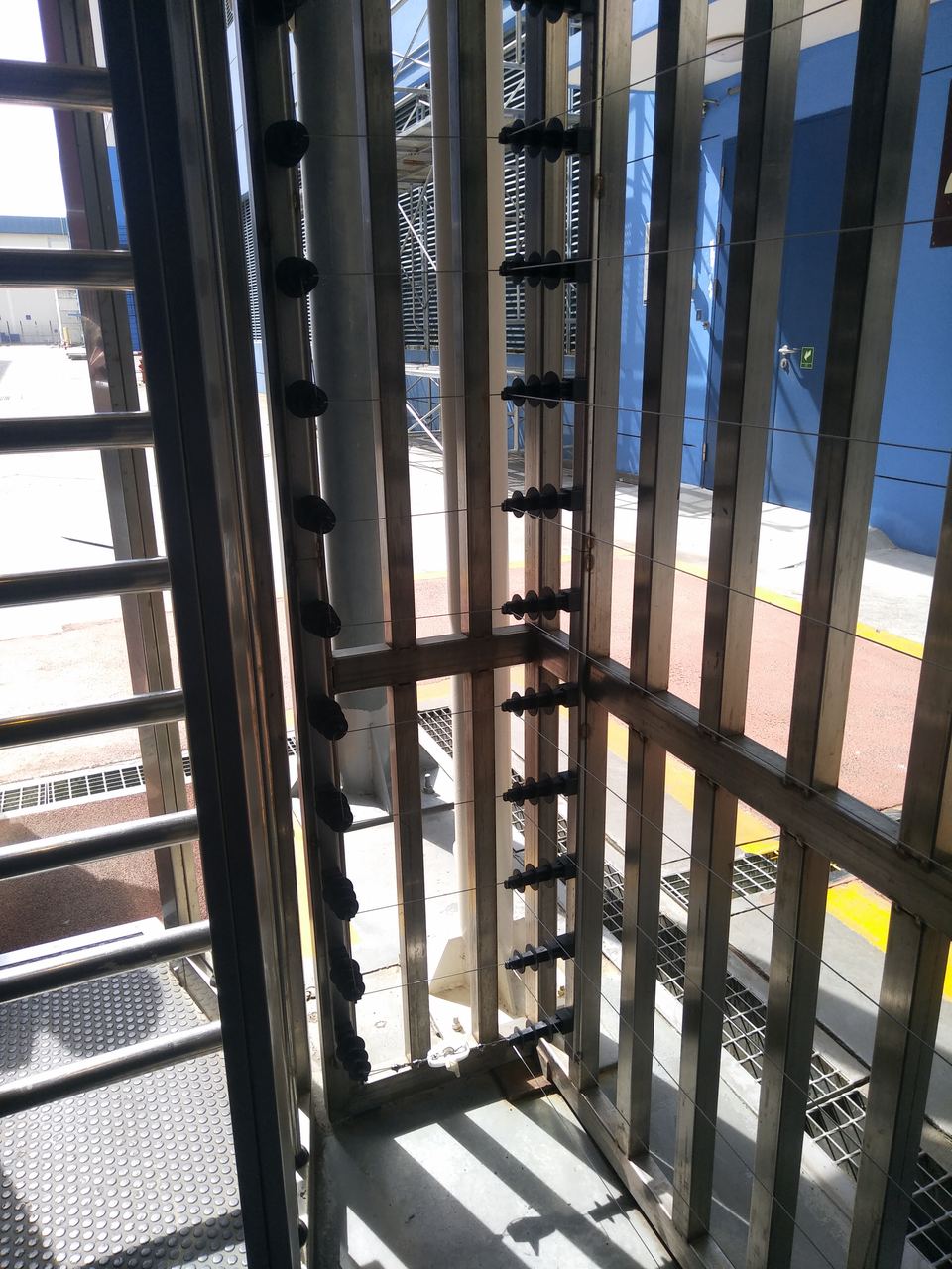 Perimeter fence sensors at industrial facility